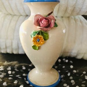 Beautiful little pottery vase with rose